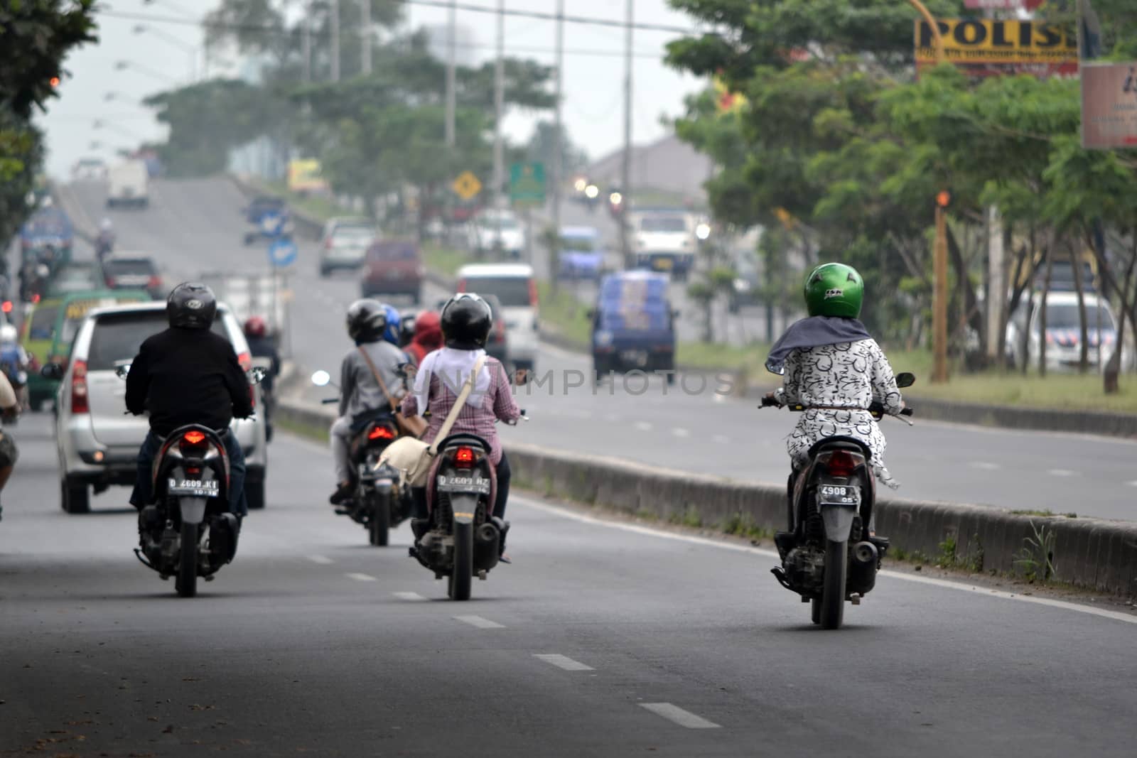 bandung, indonesia-june 5, 2014-scenery of busy traffic in bandung city, west java-indonesia