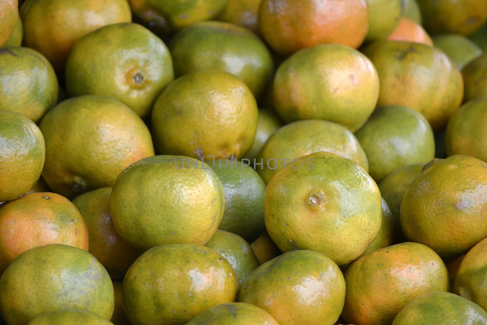 bunch of orange fruit that sold in traditional market