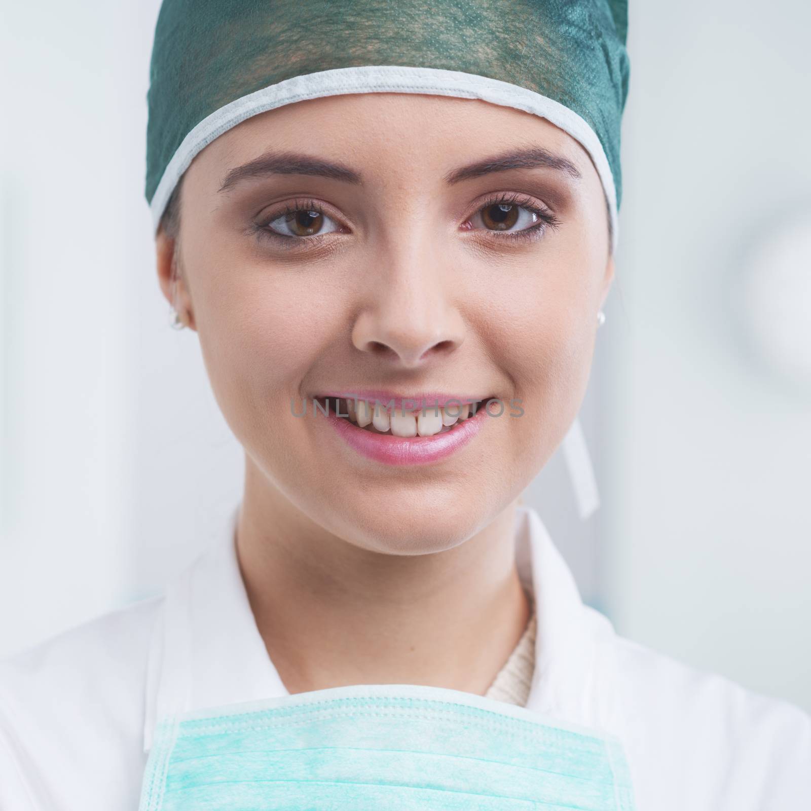 Portrait of a young beautiful female surgeon