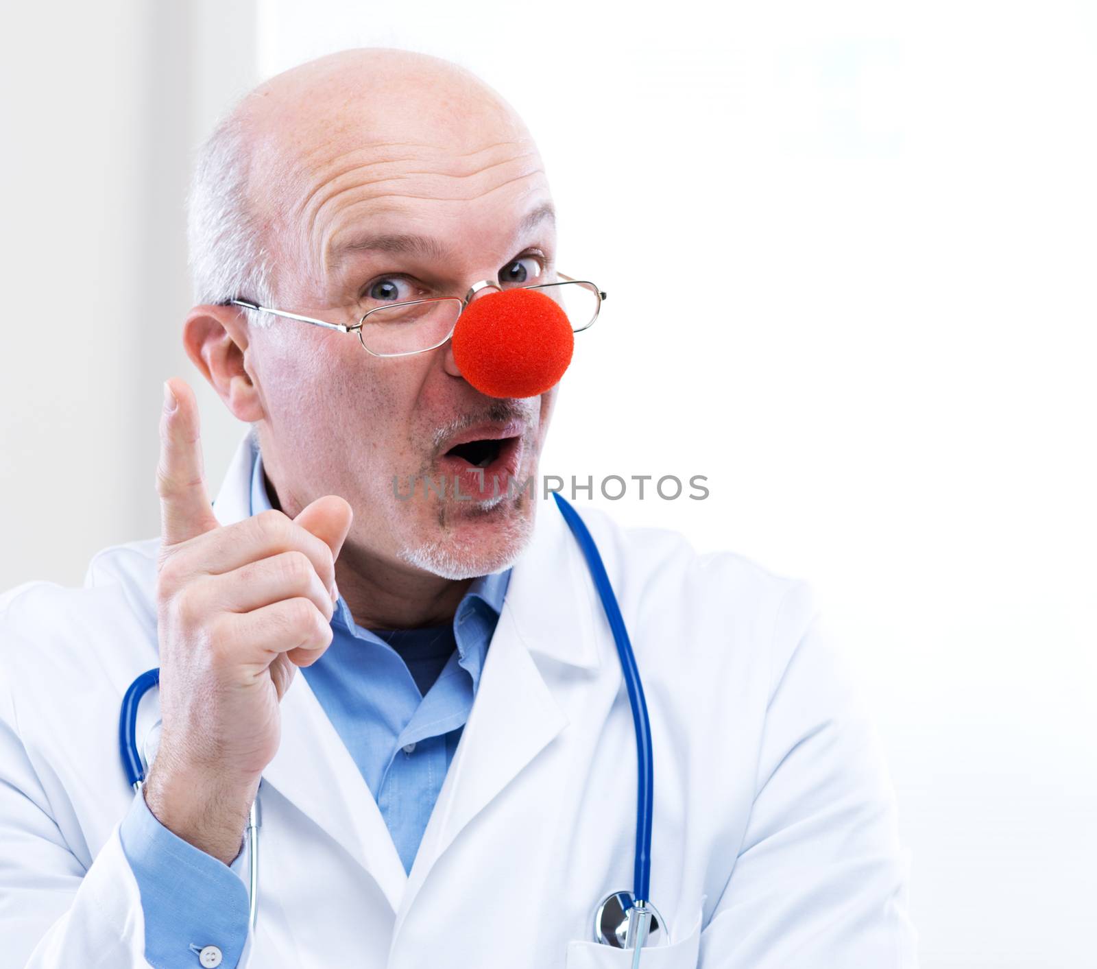 Clown doctor portrait with medical equipment.