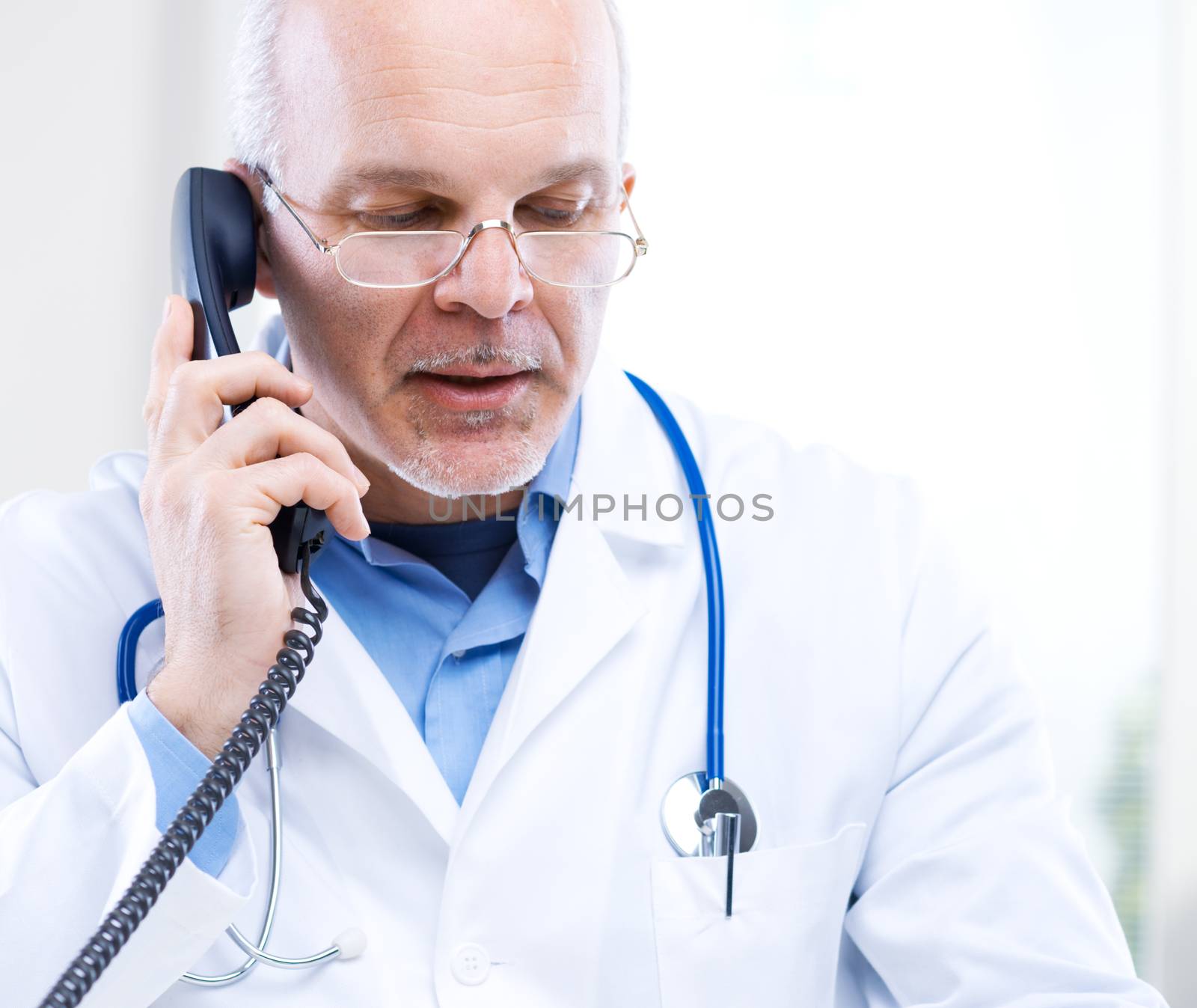 Portrait of a Doctor talking on the phone