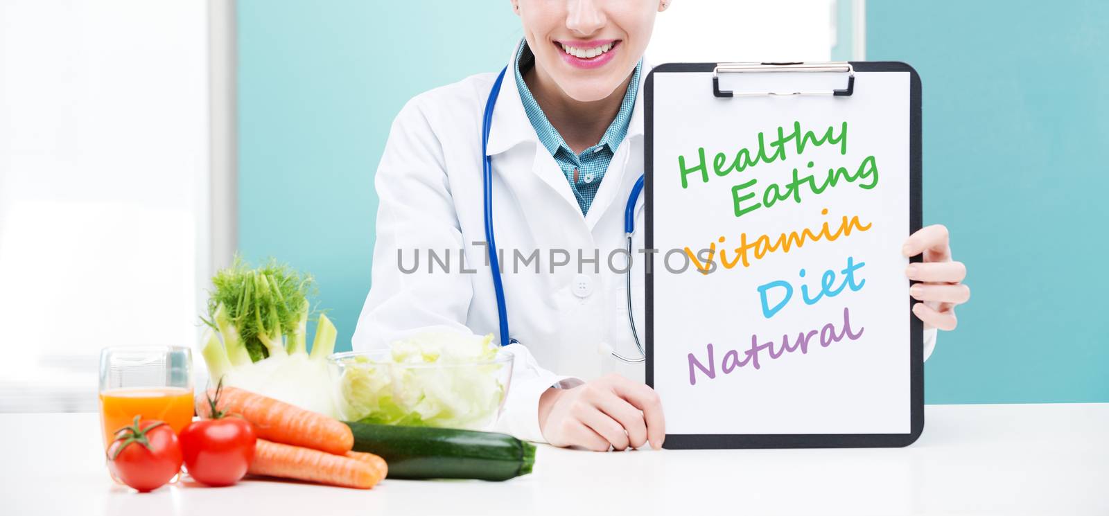 A portrait of cheerful healthcare professional promoting healthy eating
