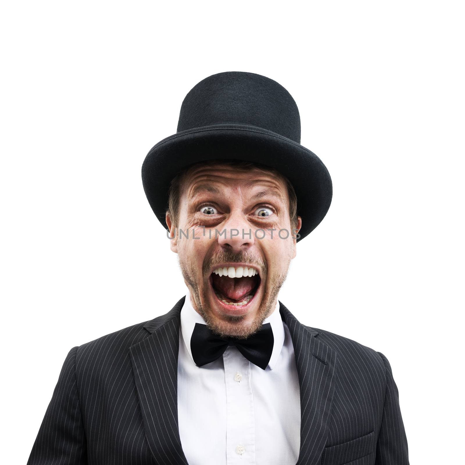 Vintage gentleman with bowler hat and bow tie screaming at camera.