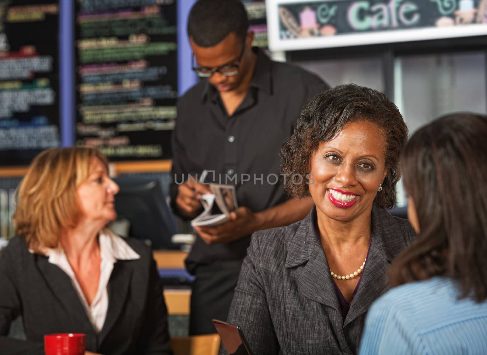 Cheerful Woman in Cafe by Creatista