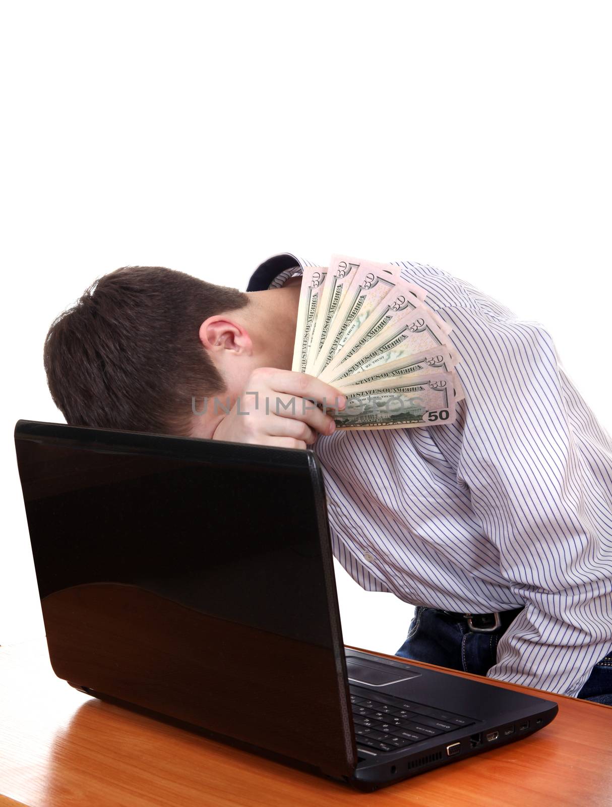 Sad Teenager with Laptop and Money by sabphoto