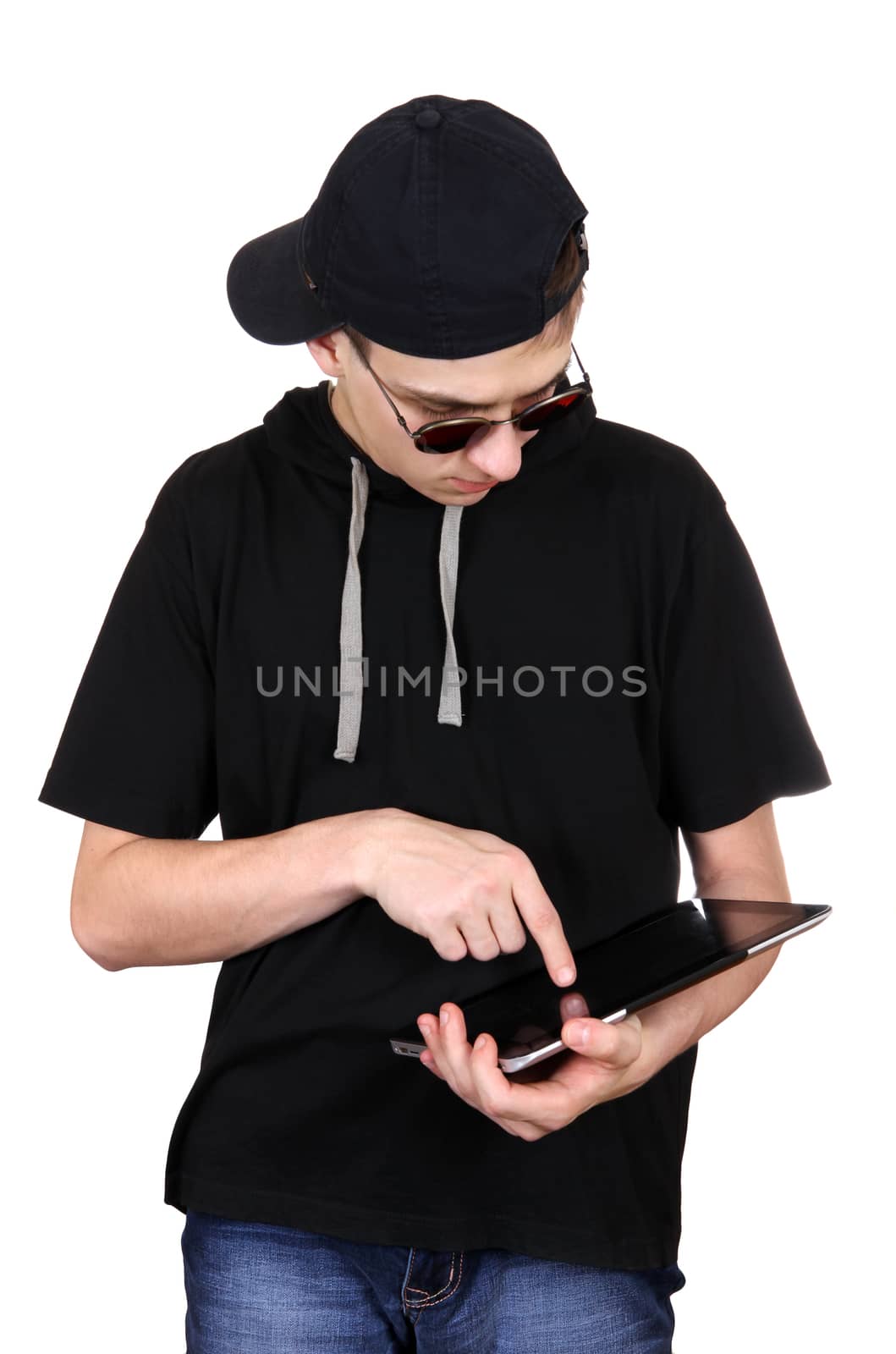 Teenager with Tablet Computer by sabphoto