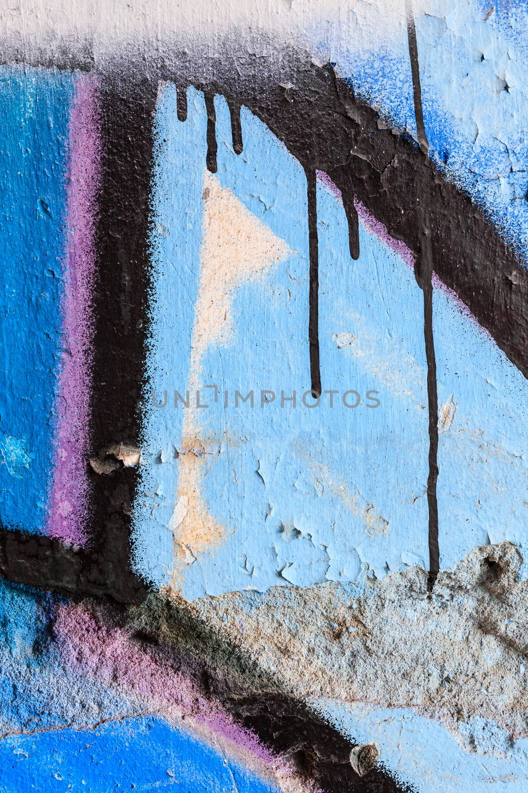 Close up of blue graffiti and dripping paint by juhku