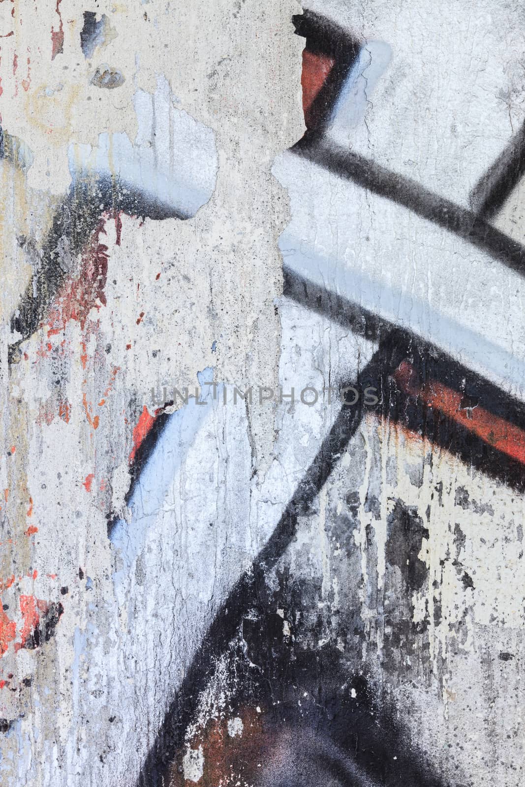 Gaffiti closeup in a damaged concrete wall by juhku