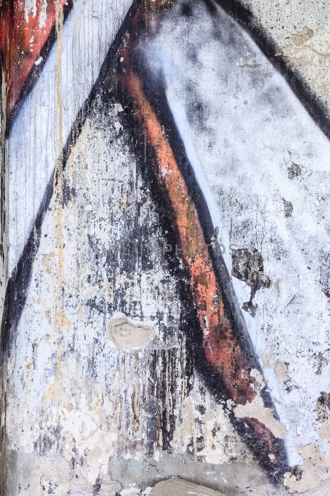 Gaffiti closeup in a damaged concrete wall