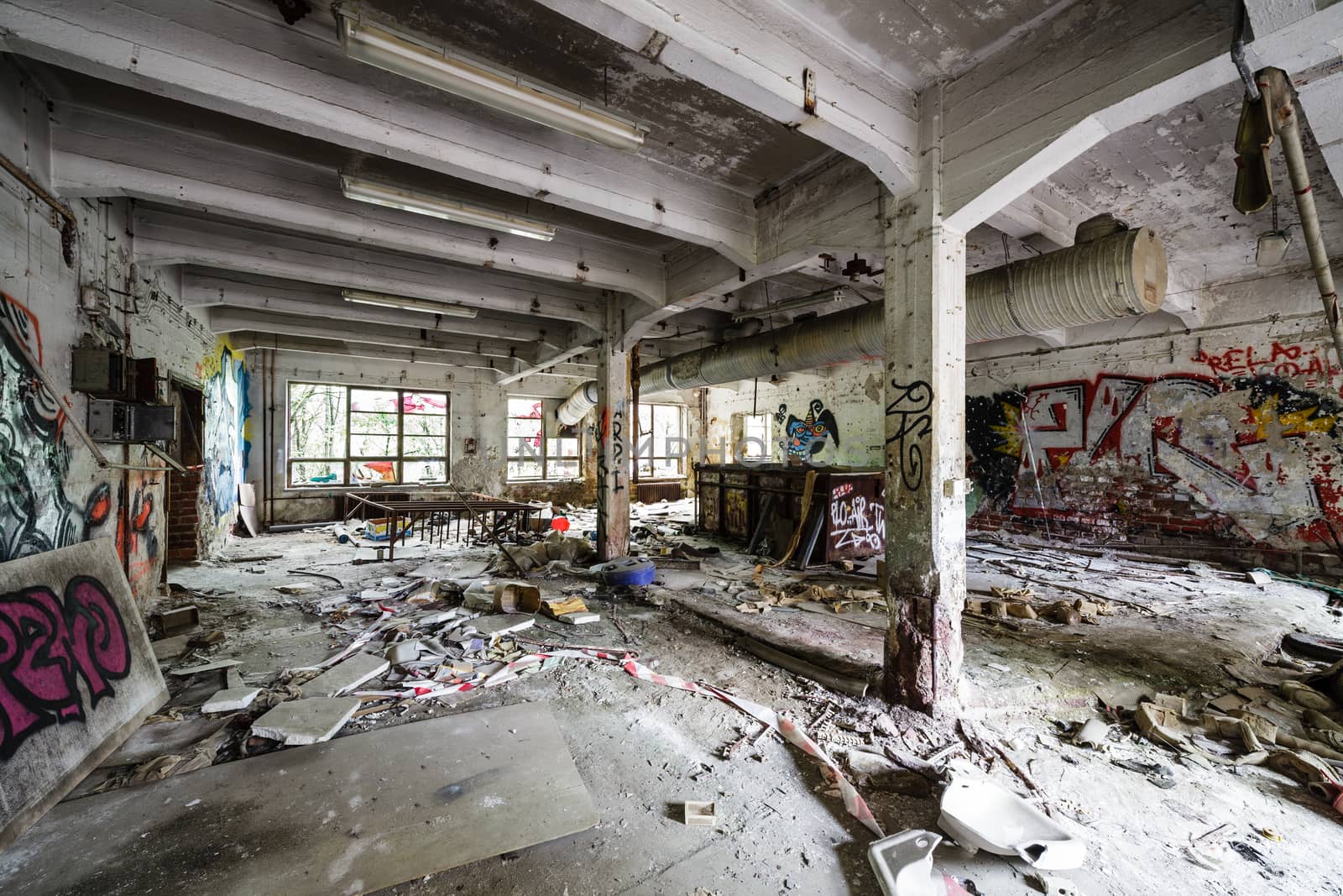 Messy abandoned factory room by juhku