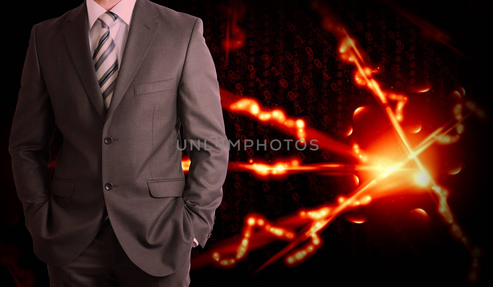 Businessman in a suit and glow rays by cherezoff