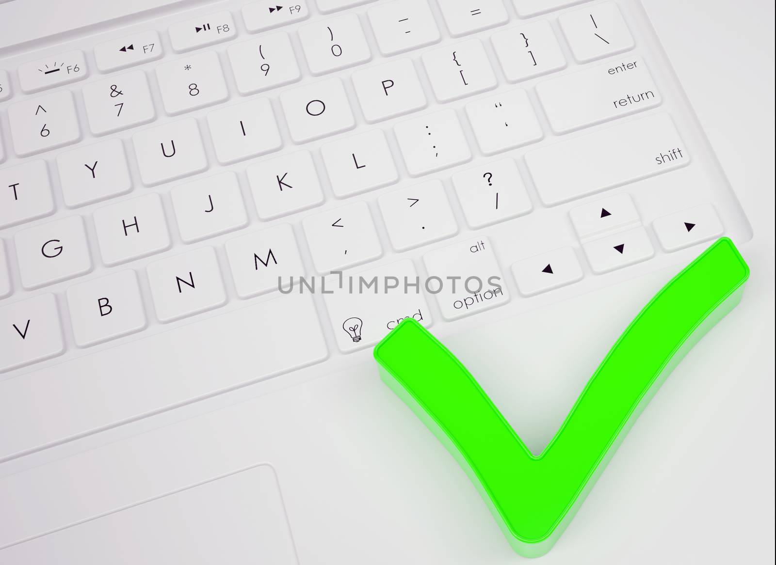 Green check mark on the keyboard by cherezoff