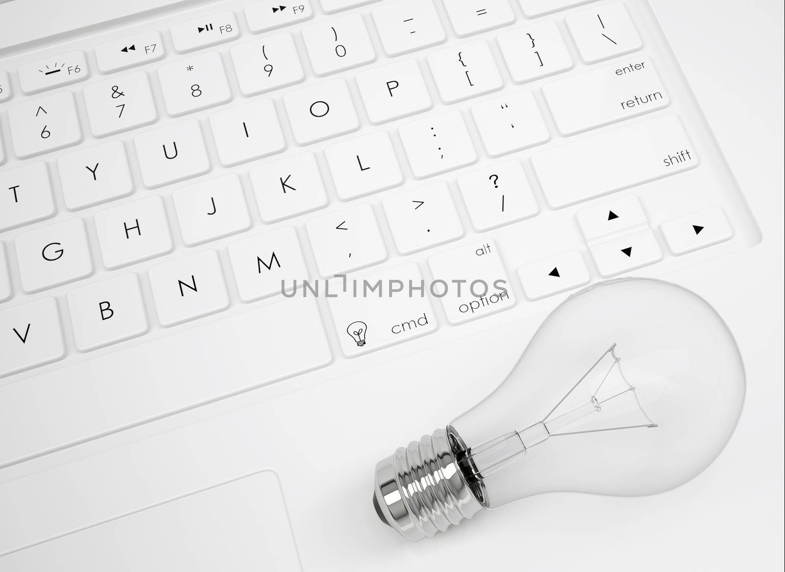 Light bulb on the keyboard. View from above