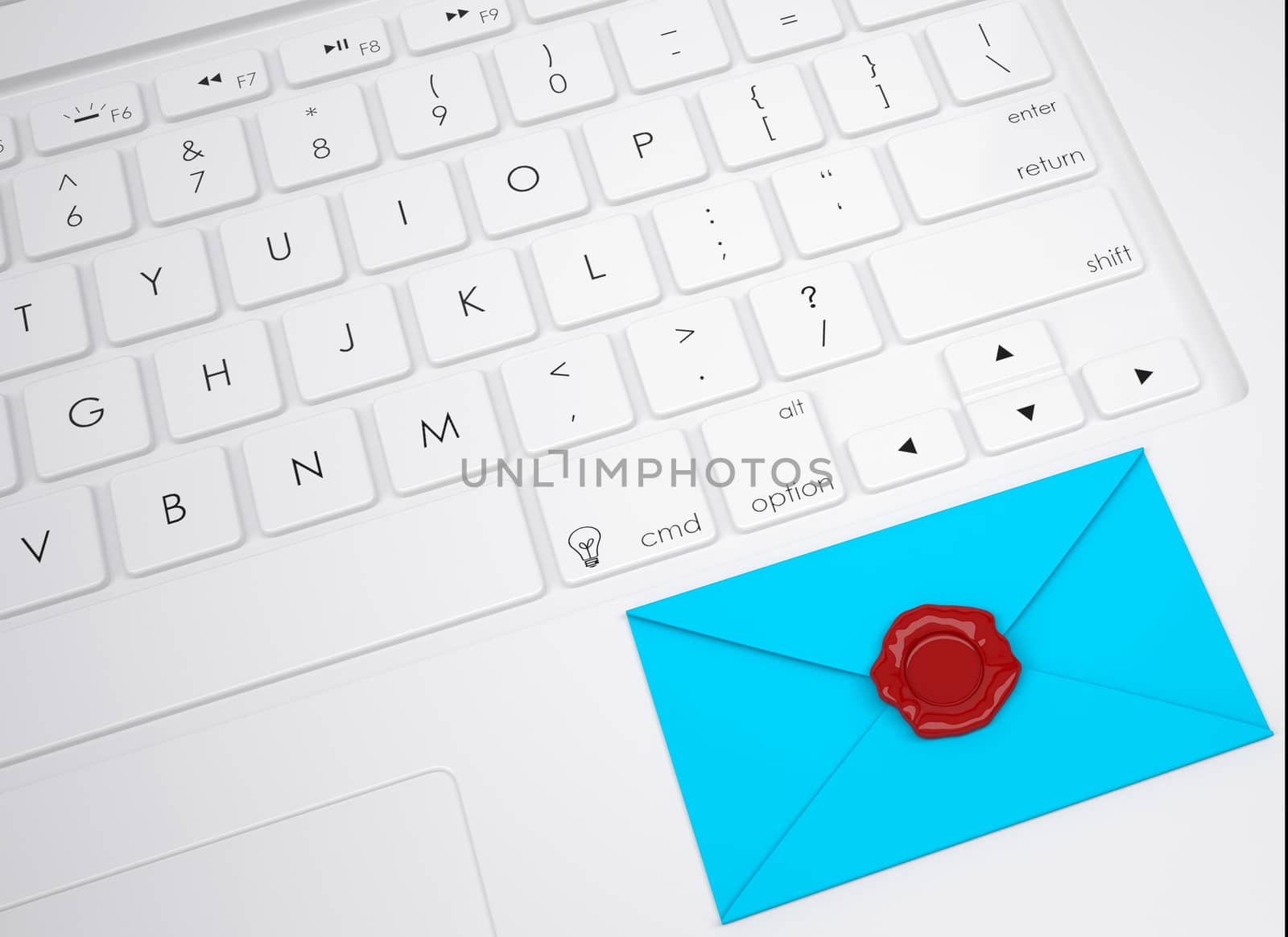 Envelope with stamp on the keyboard. View from above