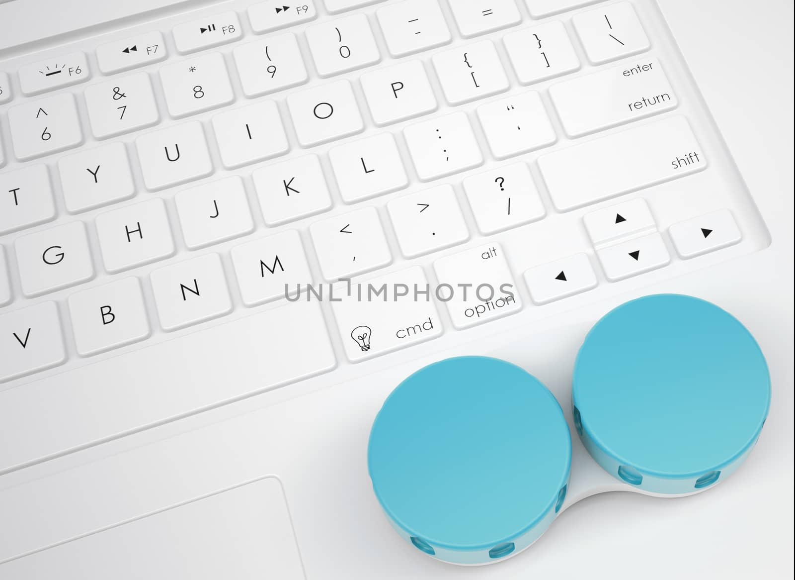 Lens container on the keyboard. View from above