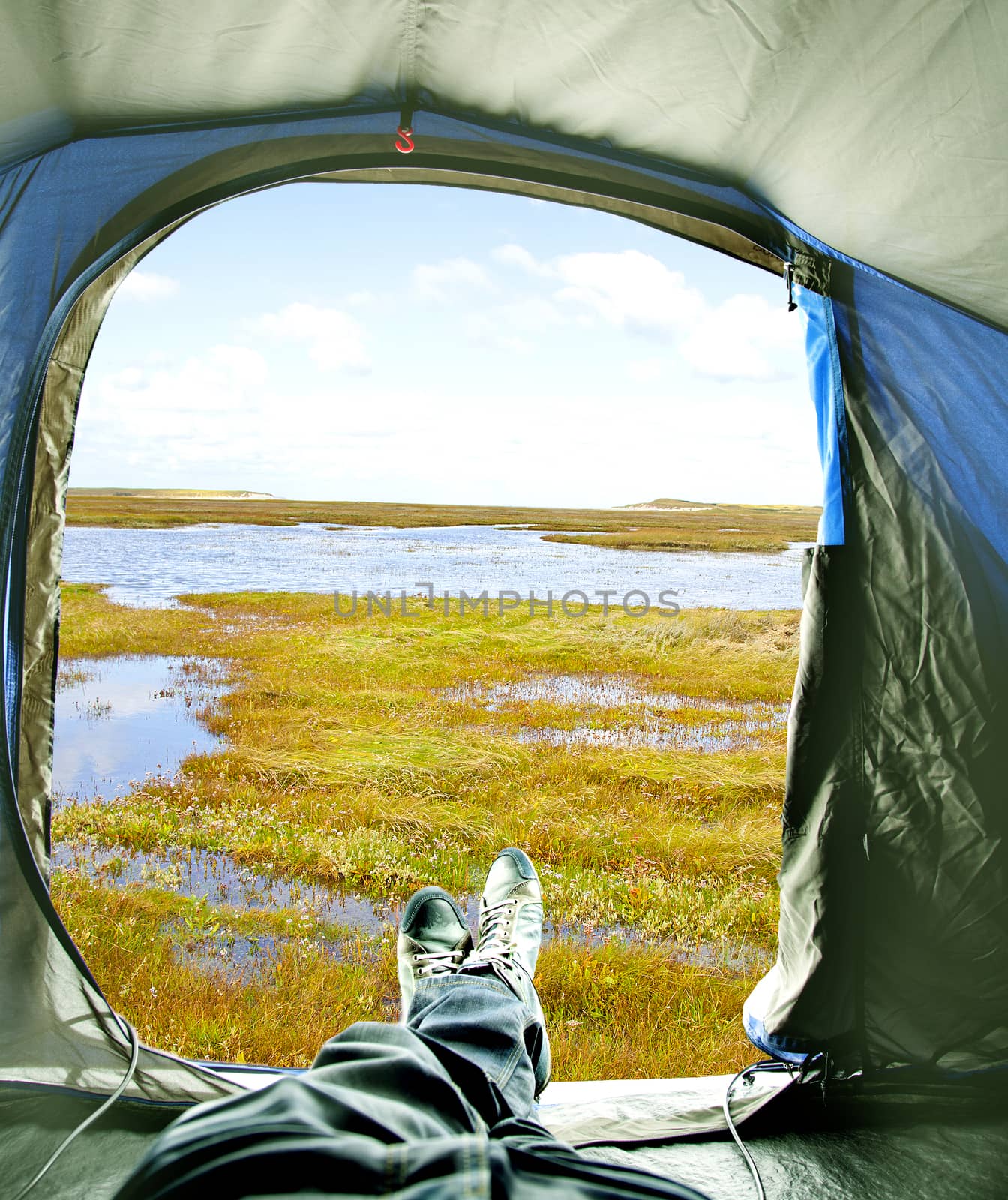 Inside of tent with view on lake