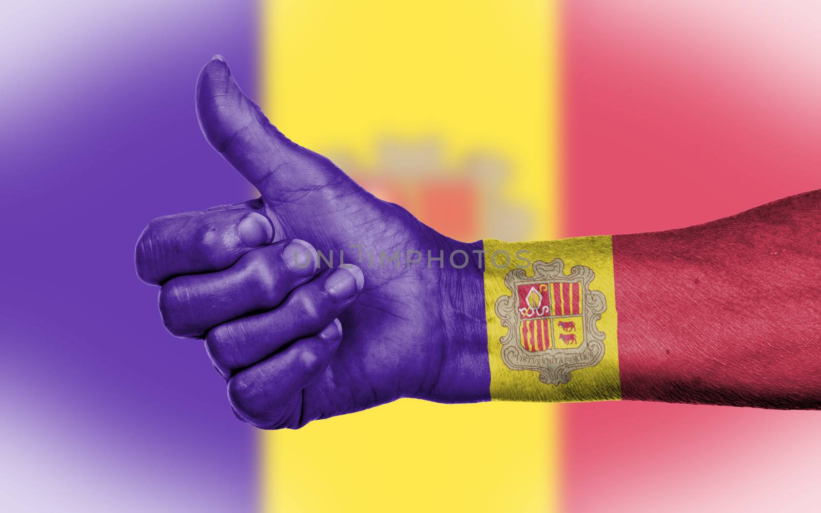 Old woman with arthritis giving the thumbs up sign, isolated on white, flag of Andorra