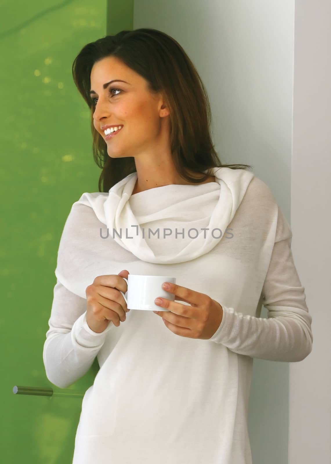 Relaxed beautiful woman drinking coffee aa by toocan