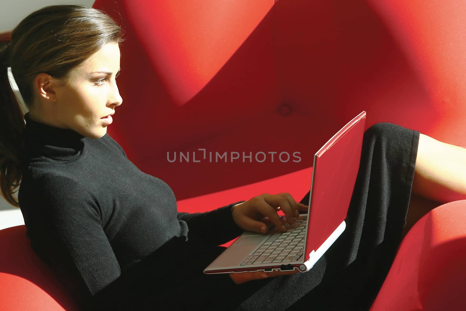 woman using laptop tyu by toocan