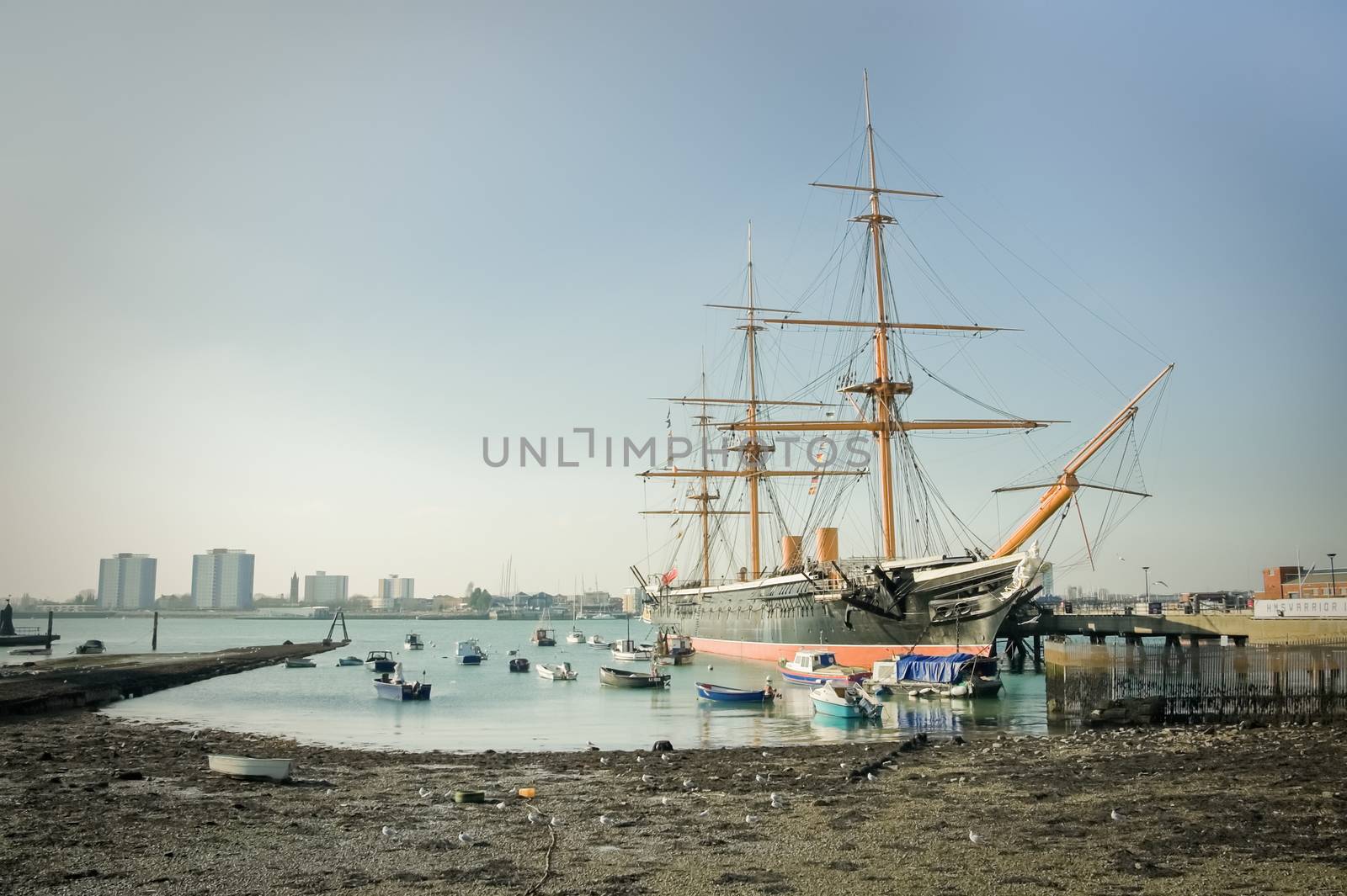 Portsmouth, UK - February 1, 2012: HMS Warrior, the first iron-clad battleship launched by the British Royal in 1860, now a floating museum moored in Portsmouth harbor, UK