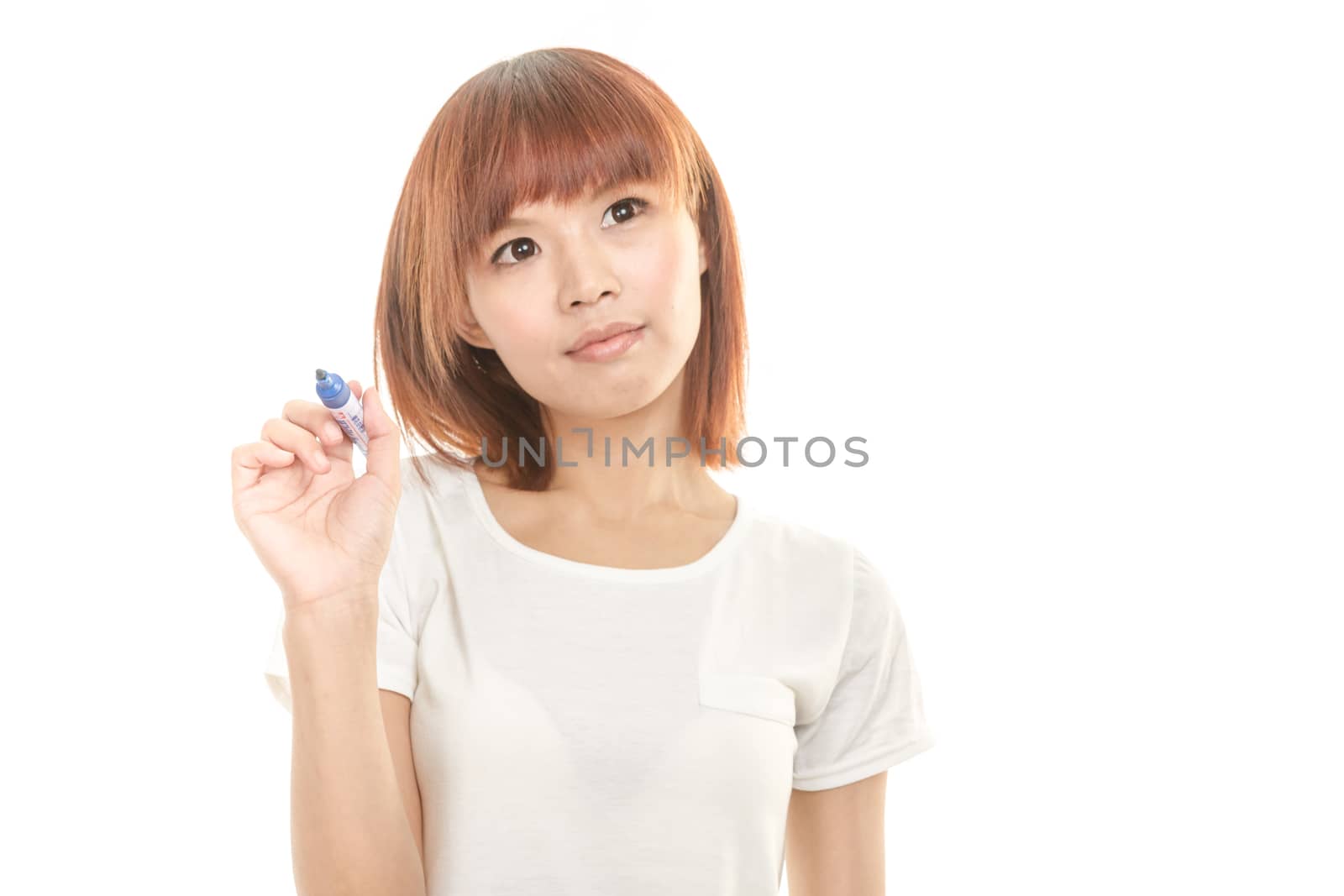 Asian woman writing with blue marker on imaginary board by imagesbykenny