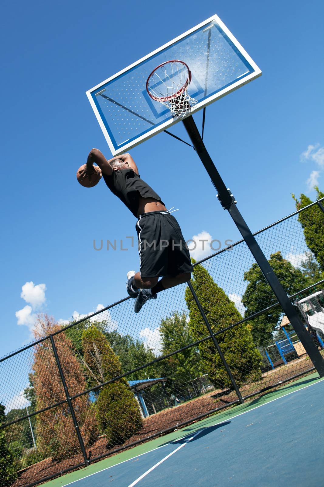 Basketball Player Dunking by graficallyminded