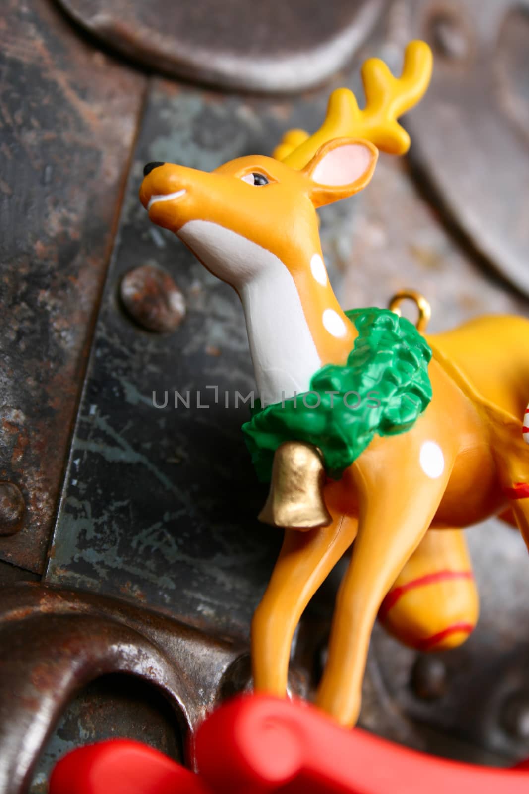 Antique Christmas tree ornament against a worn background