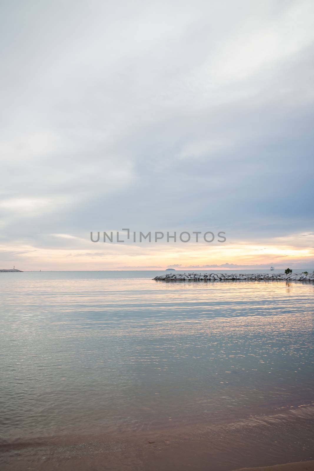 Sunset view of sea beach, stock photo