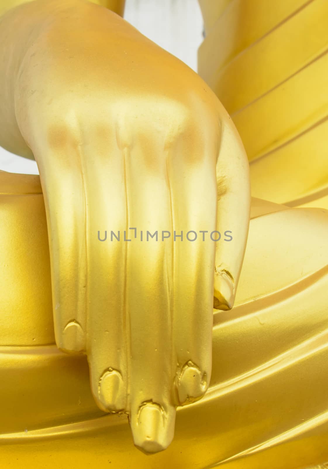 the gorgeous golden buddha hand in the temple