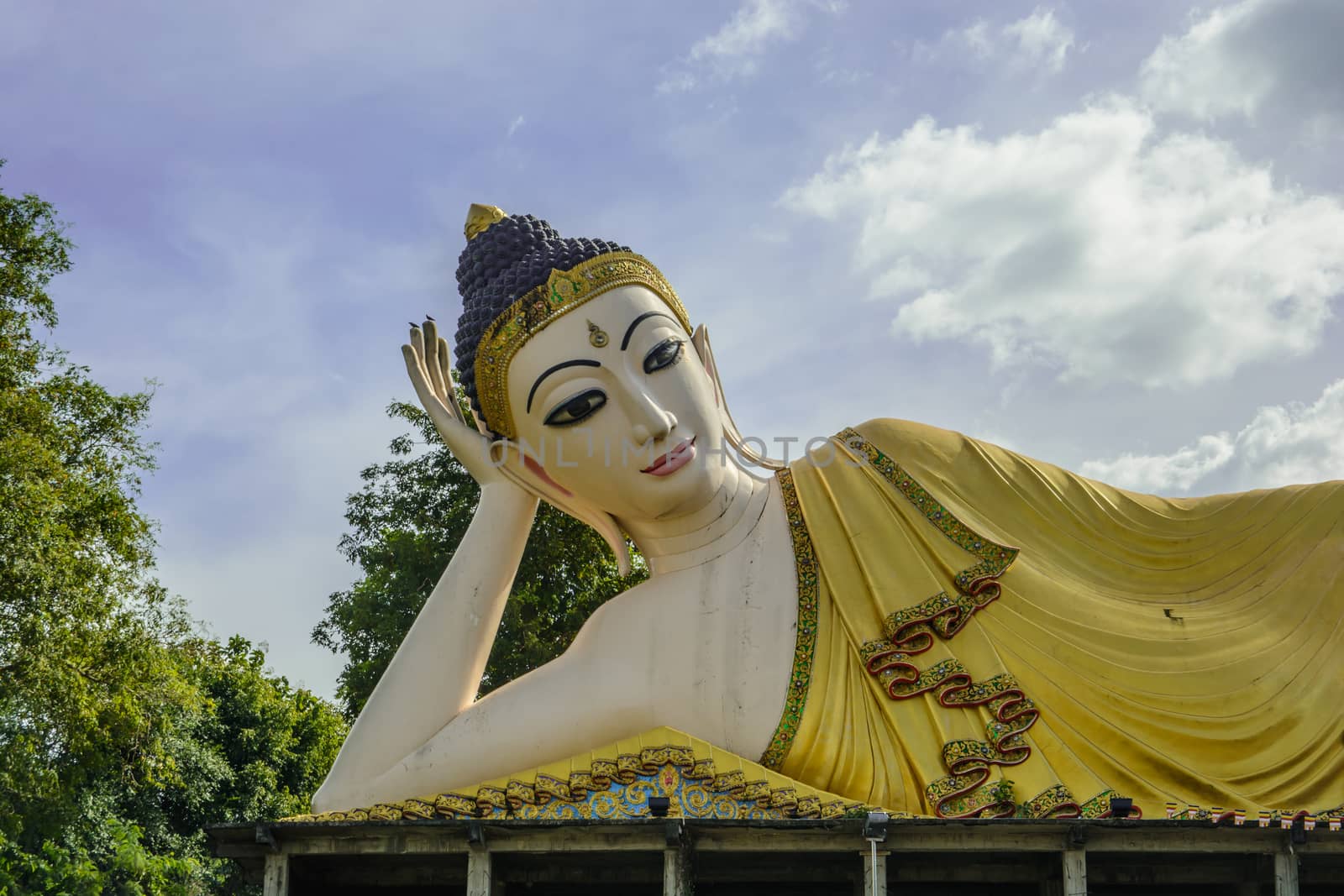 Beautiful lying budha at Wat Pratatsutone Mongkonkiri. This Budha statue is built from donation money of the people in the village and surrounding areas for the meaning of Budhism dedication.