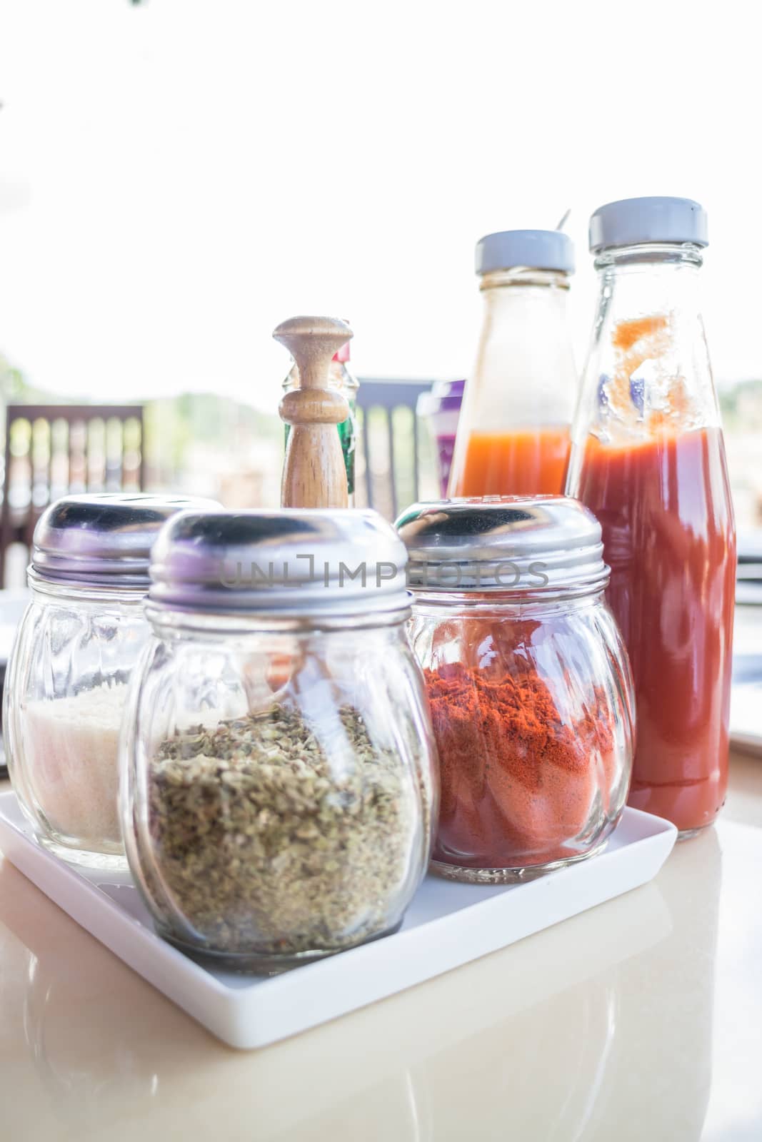 Set of seasoning and sauce bottles, stock photo