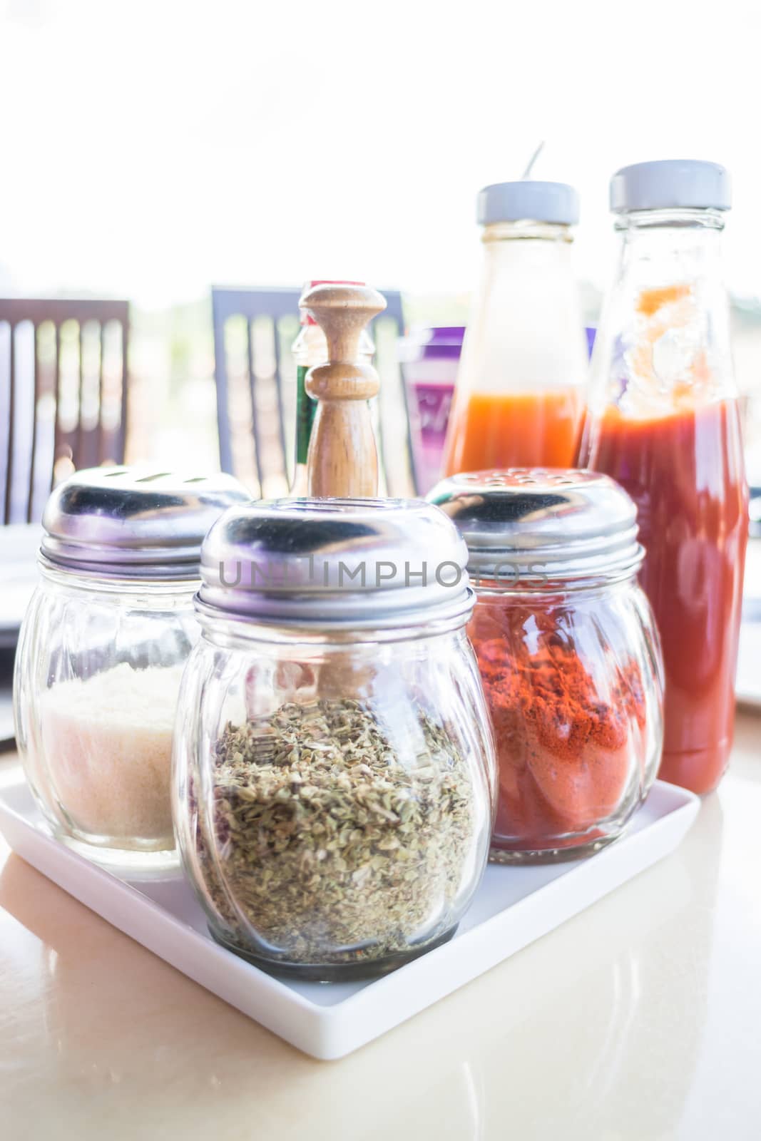 Set of seasoning and sauce bottles, stock photo