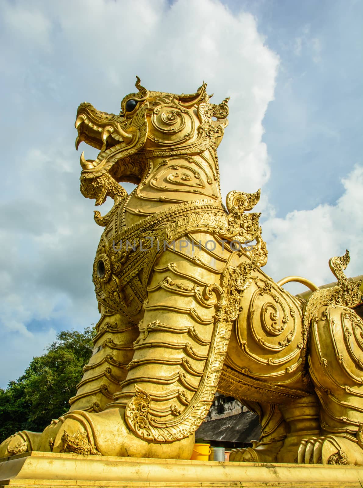 The lion statue is built by the donation money from people in the village.