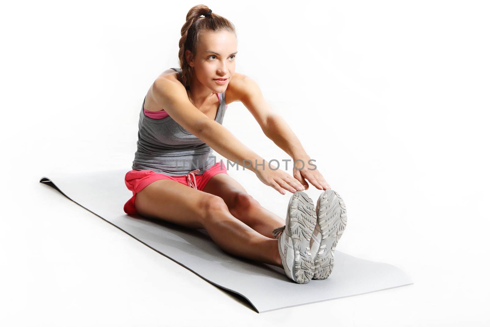 gymnastic exercises on the mat