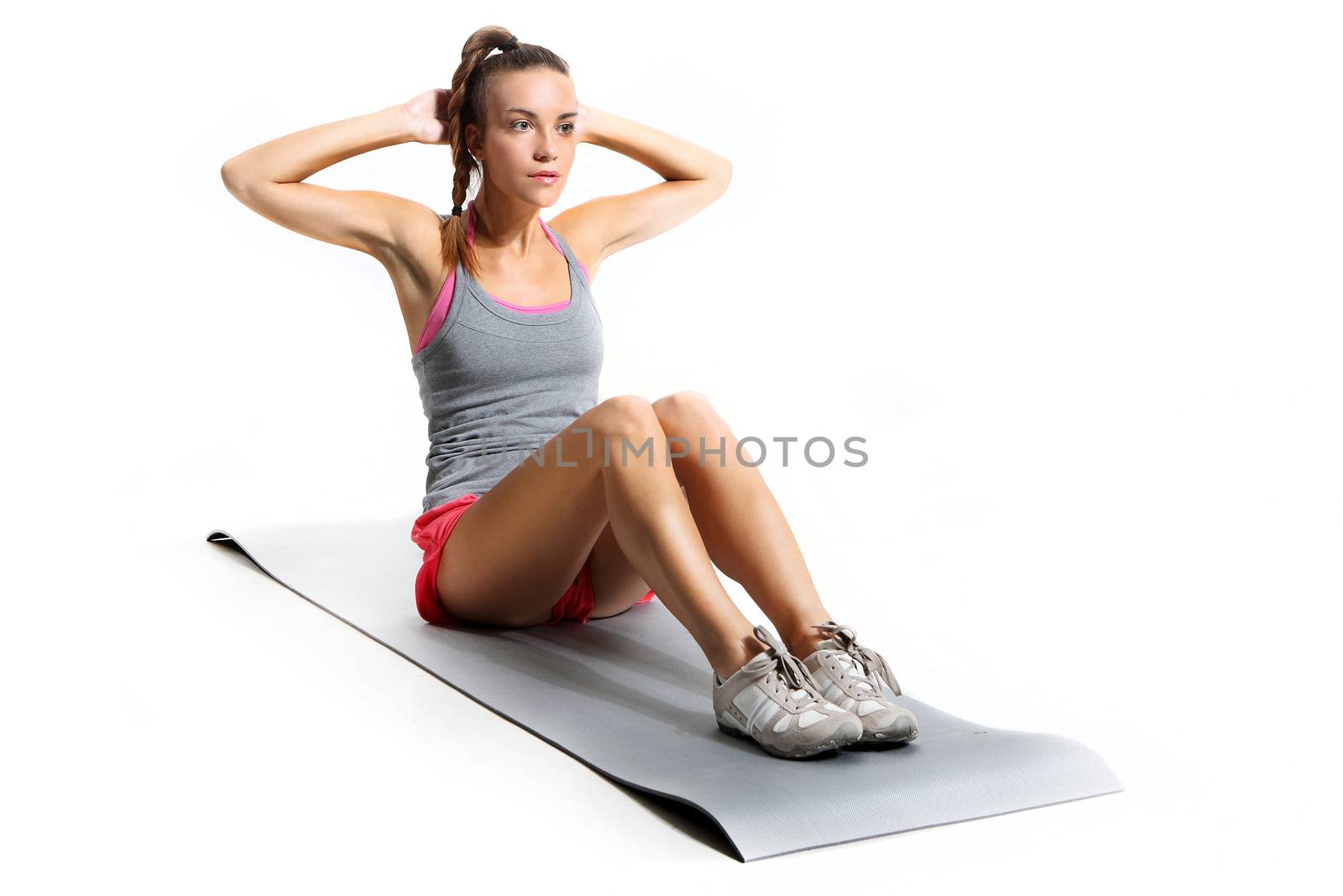 gymnastic exercises on the mat