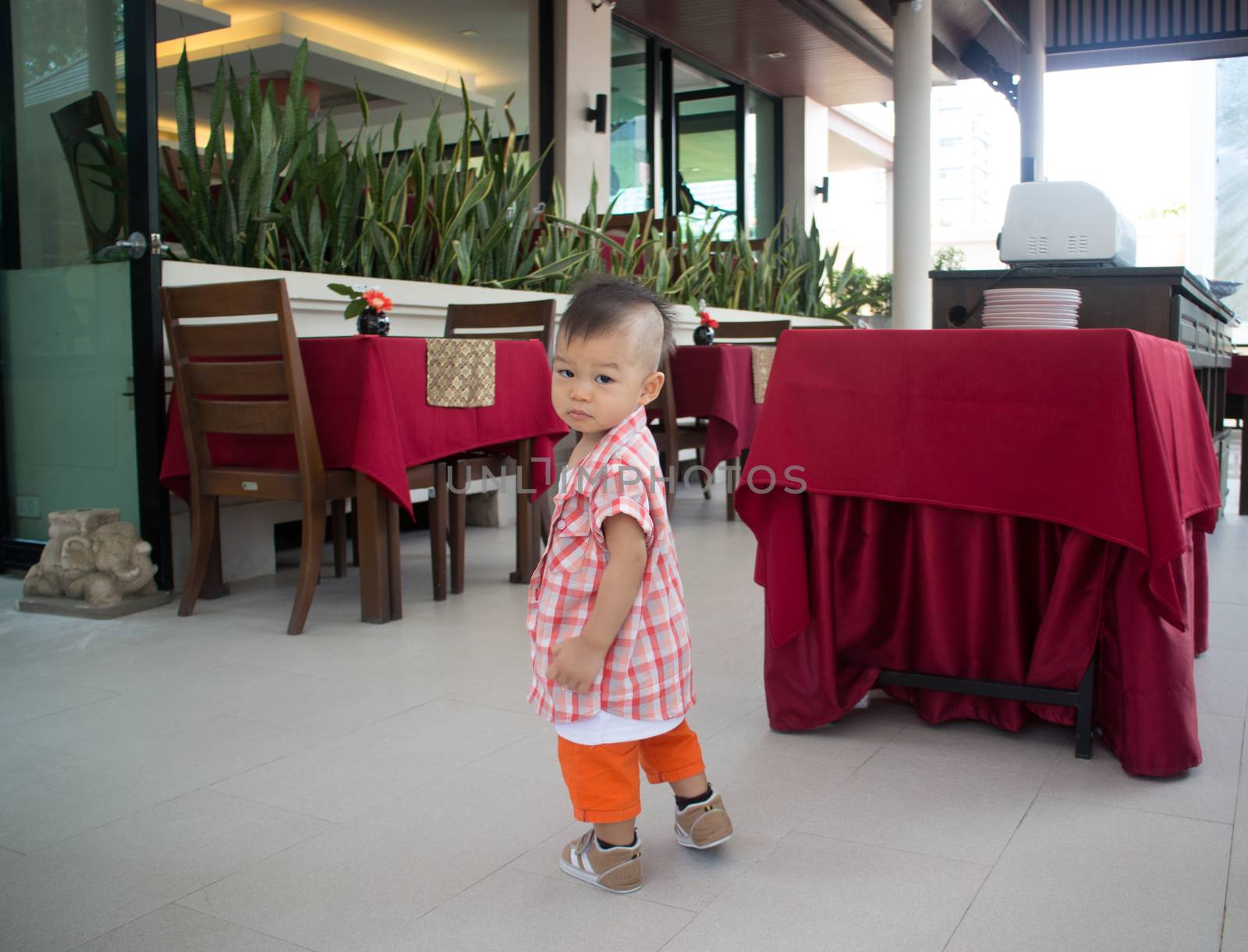 Asian cute boy pose looking back, stock photo