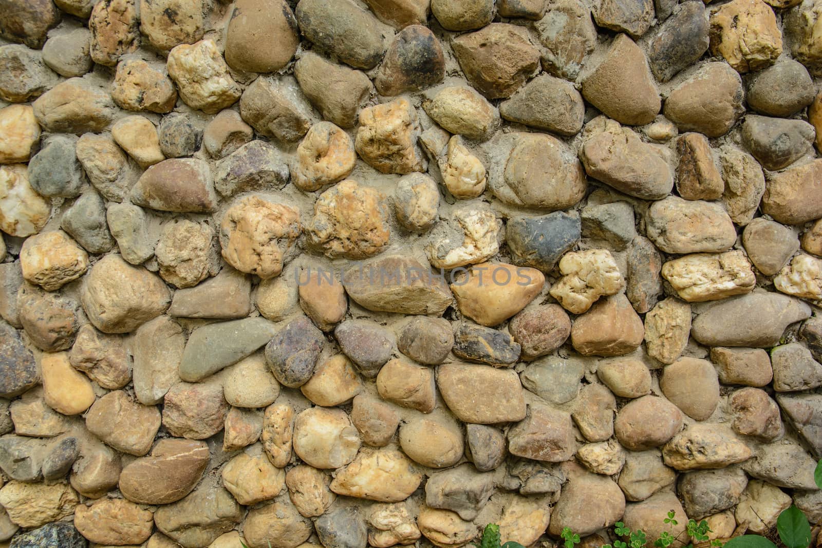 the stone texture for background purpose. this is a stone wall of the public toilet