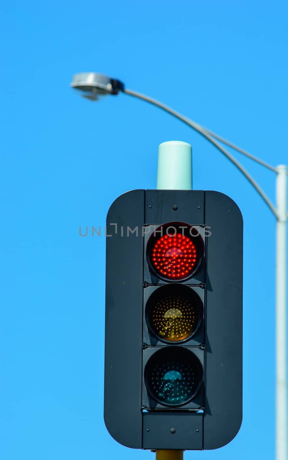 This traffic light indicates a good symbol of controling the street.