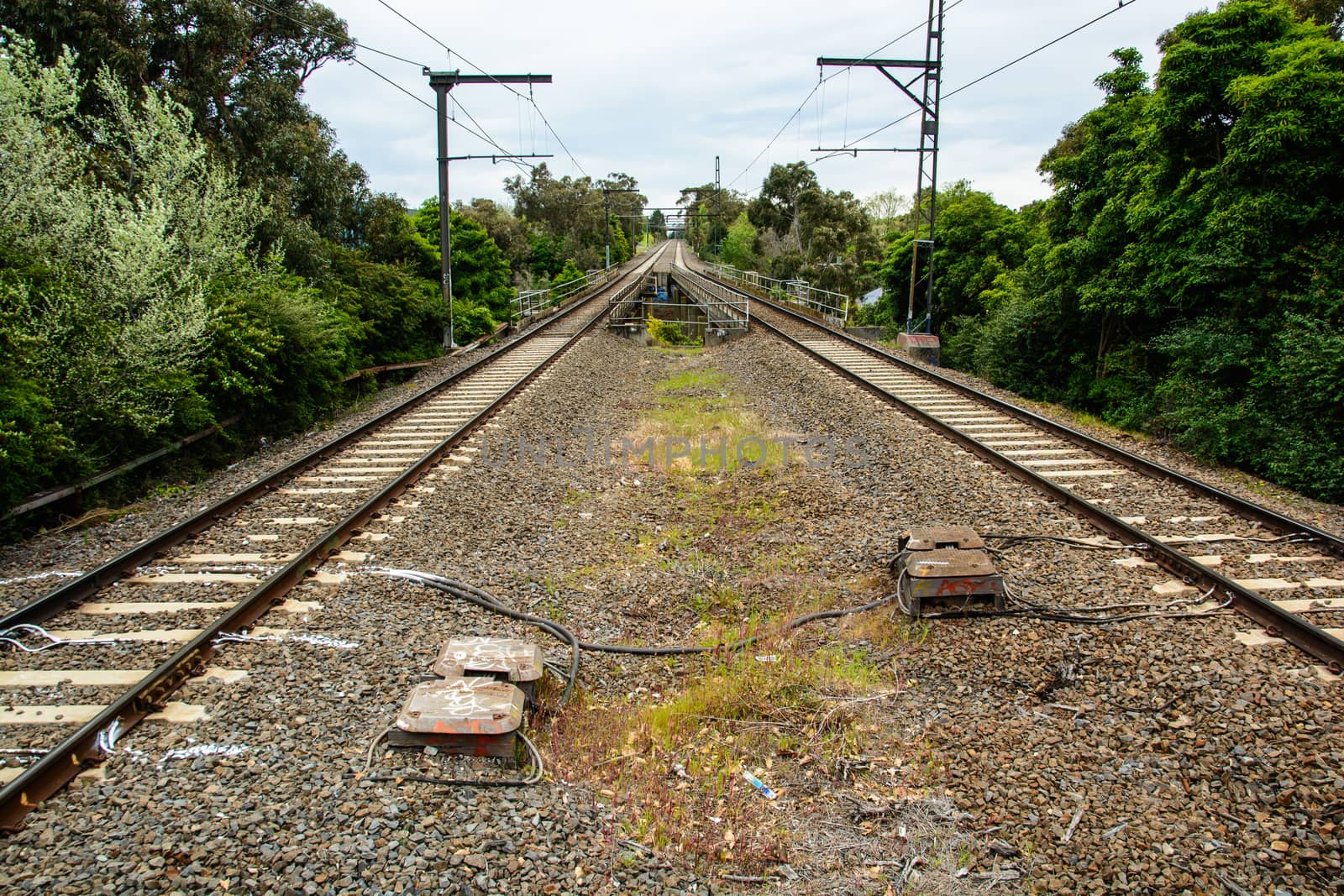 The long train track laid forward from the station to another station.