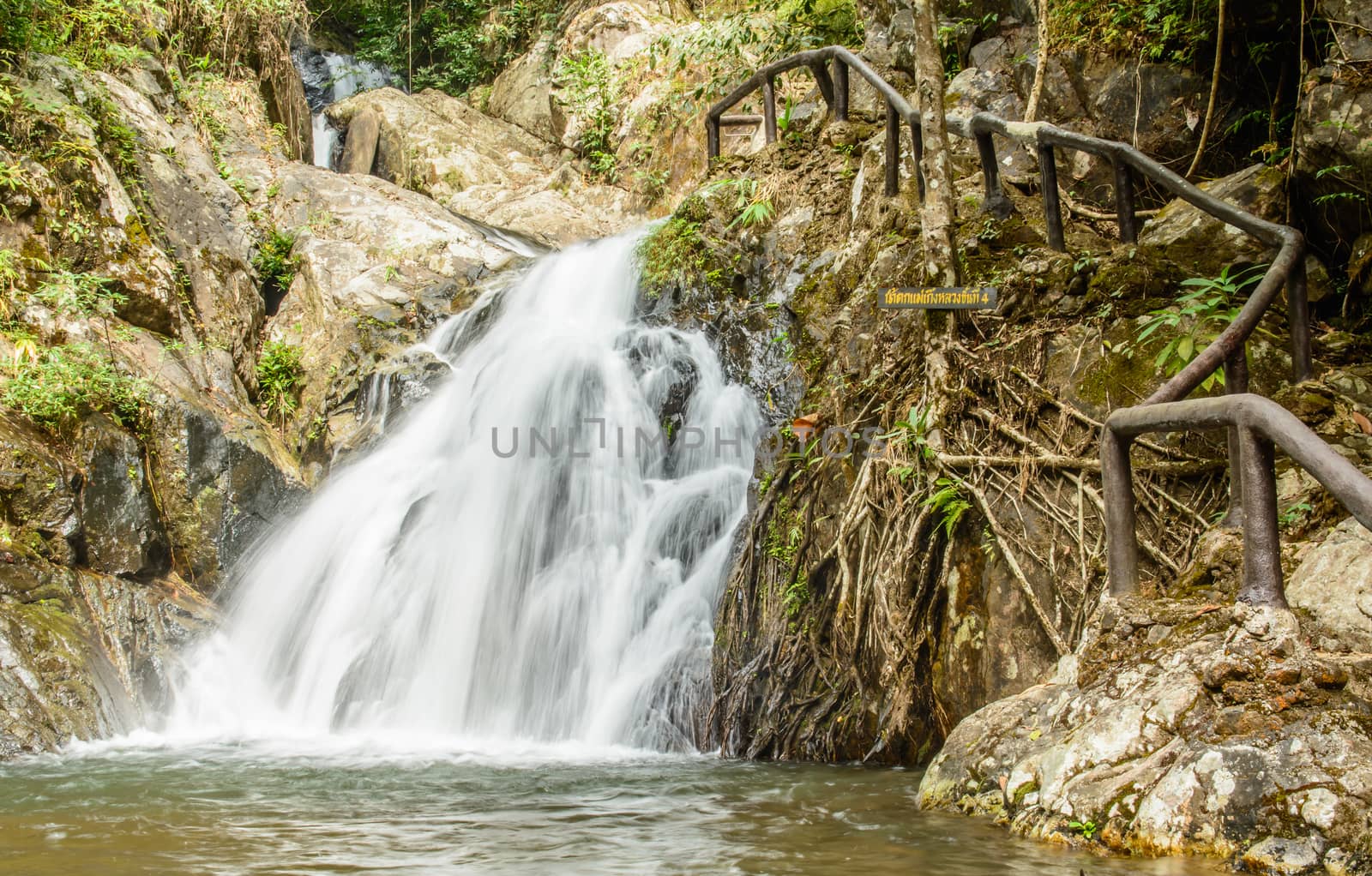 the gorgeous waterfall in the forest of the North of Thailand