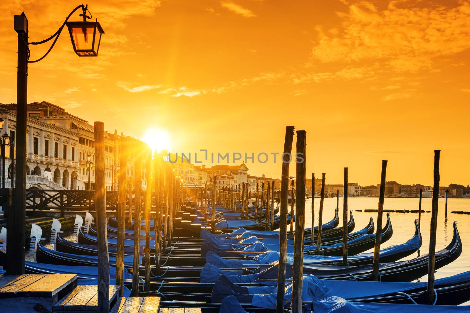 View of Venice with gondolas at sunrise