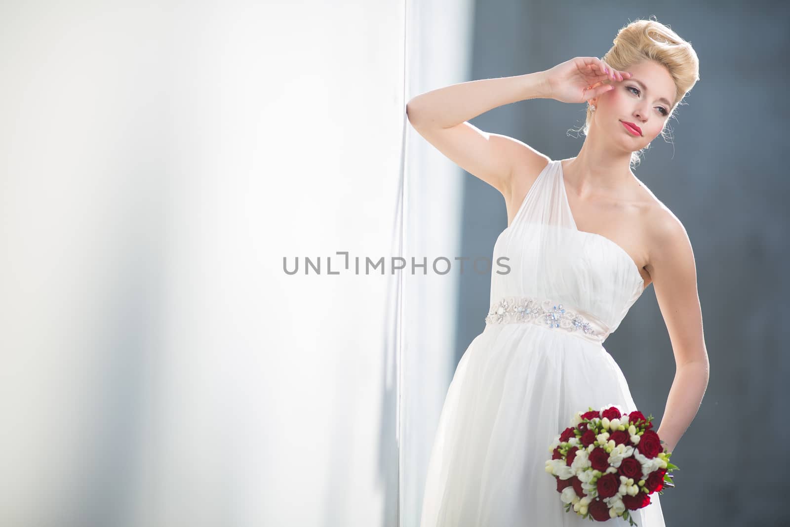 Gorgeous bride on her wedding day (color toned image; shallow DOF)