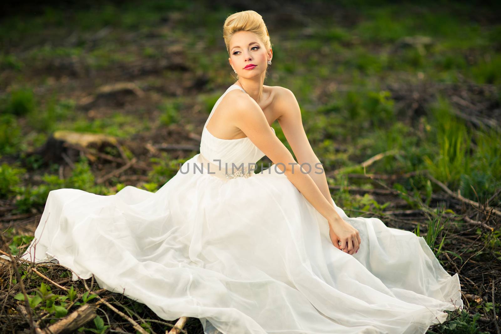 Lovely bride outdoors in a forest