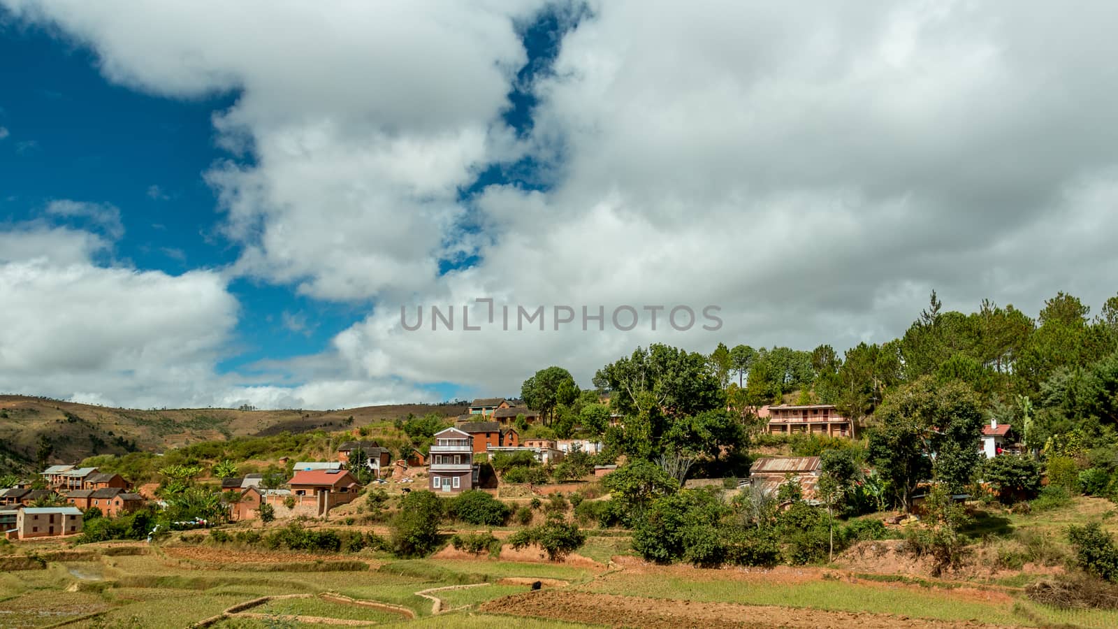 Malagasy homes build along the hills of  the central highlands of Madagascar