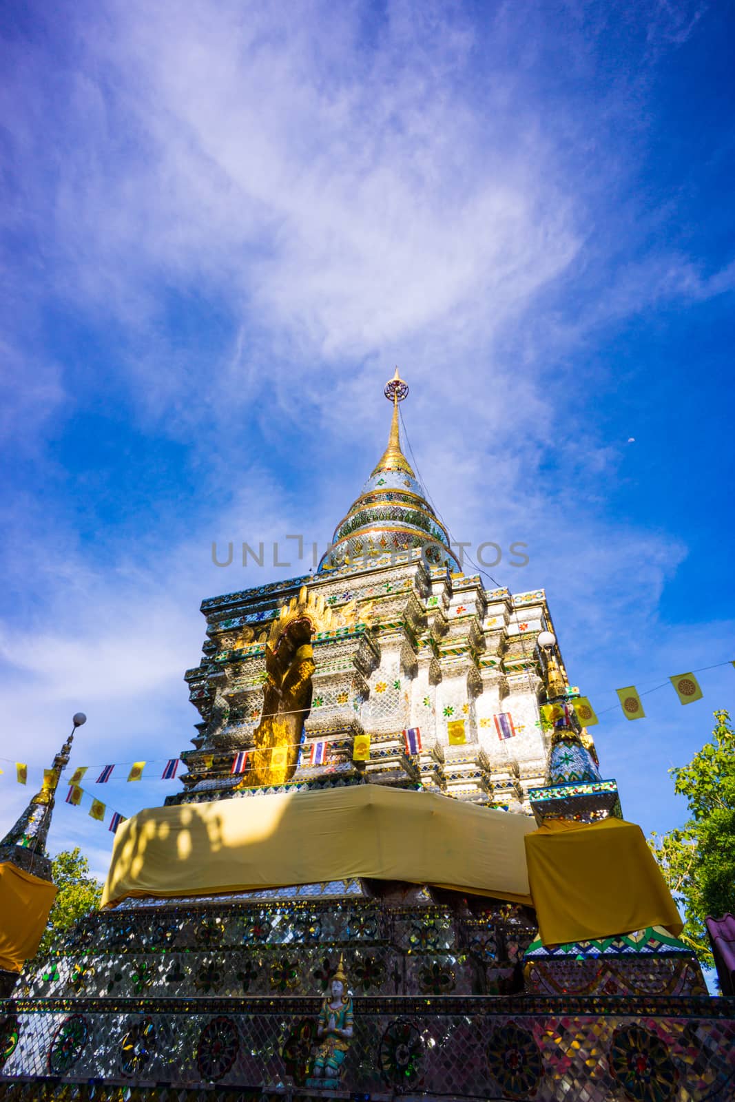 mirror decorated pagoda on clear sky scene,Chiangrai,Thailand