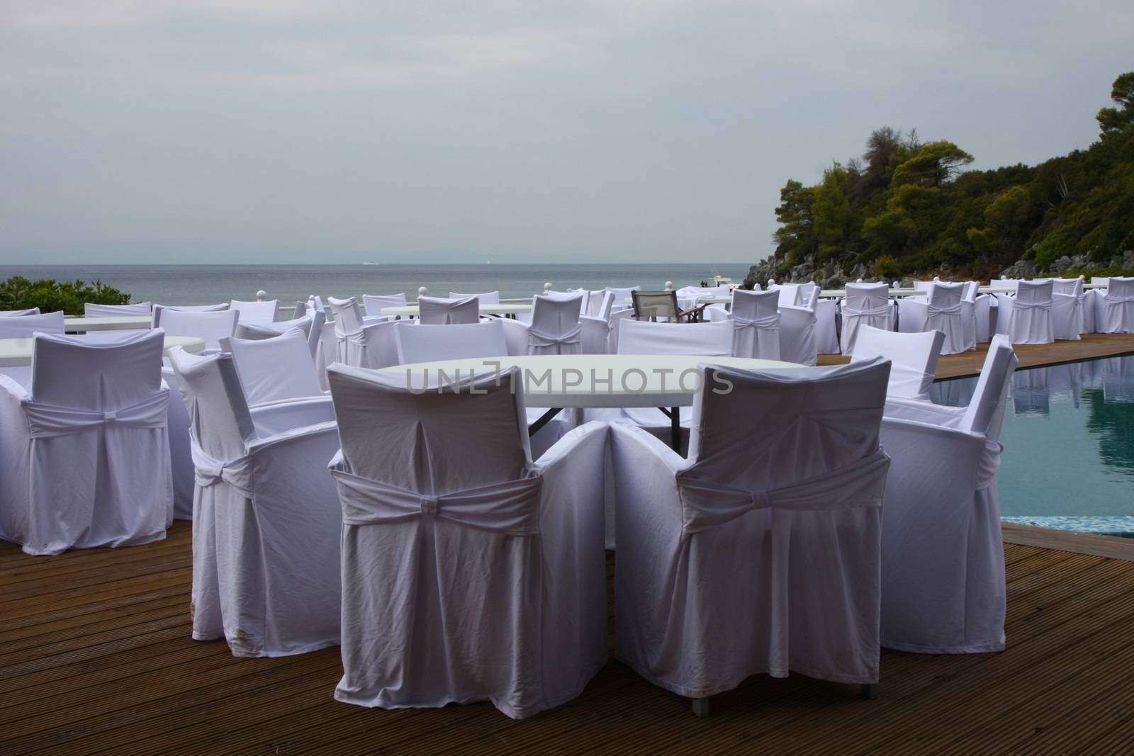 Decoration of wedding chairs and tables at the seaside
