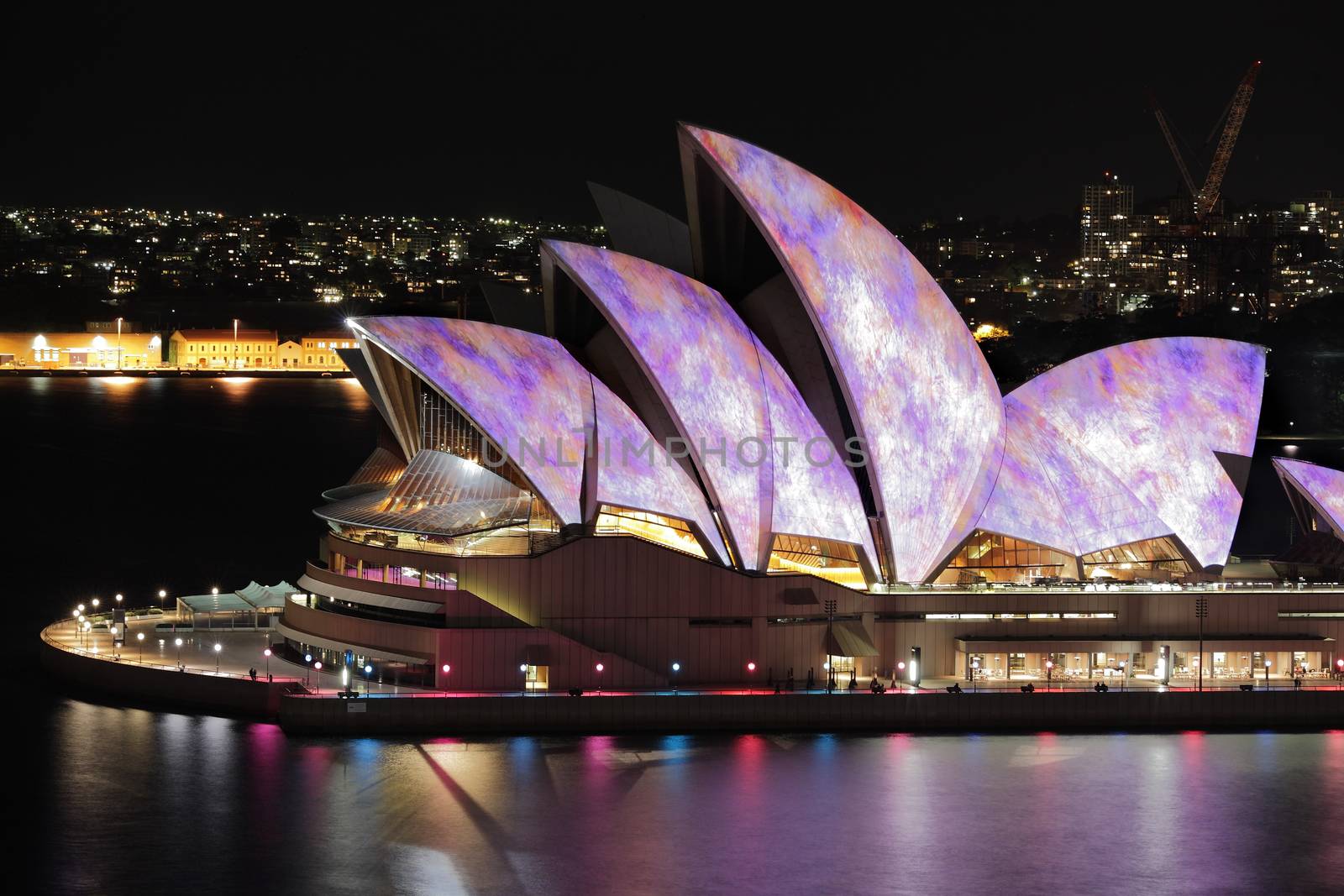 YDNEY, NSW, AUSTRALIA - JUNE 6, 2014;  Iconic Sydney Opera House in vibrant colourful imagery during Vivid Sydney annual festival event.