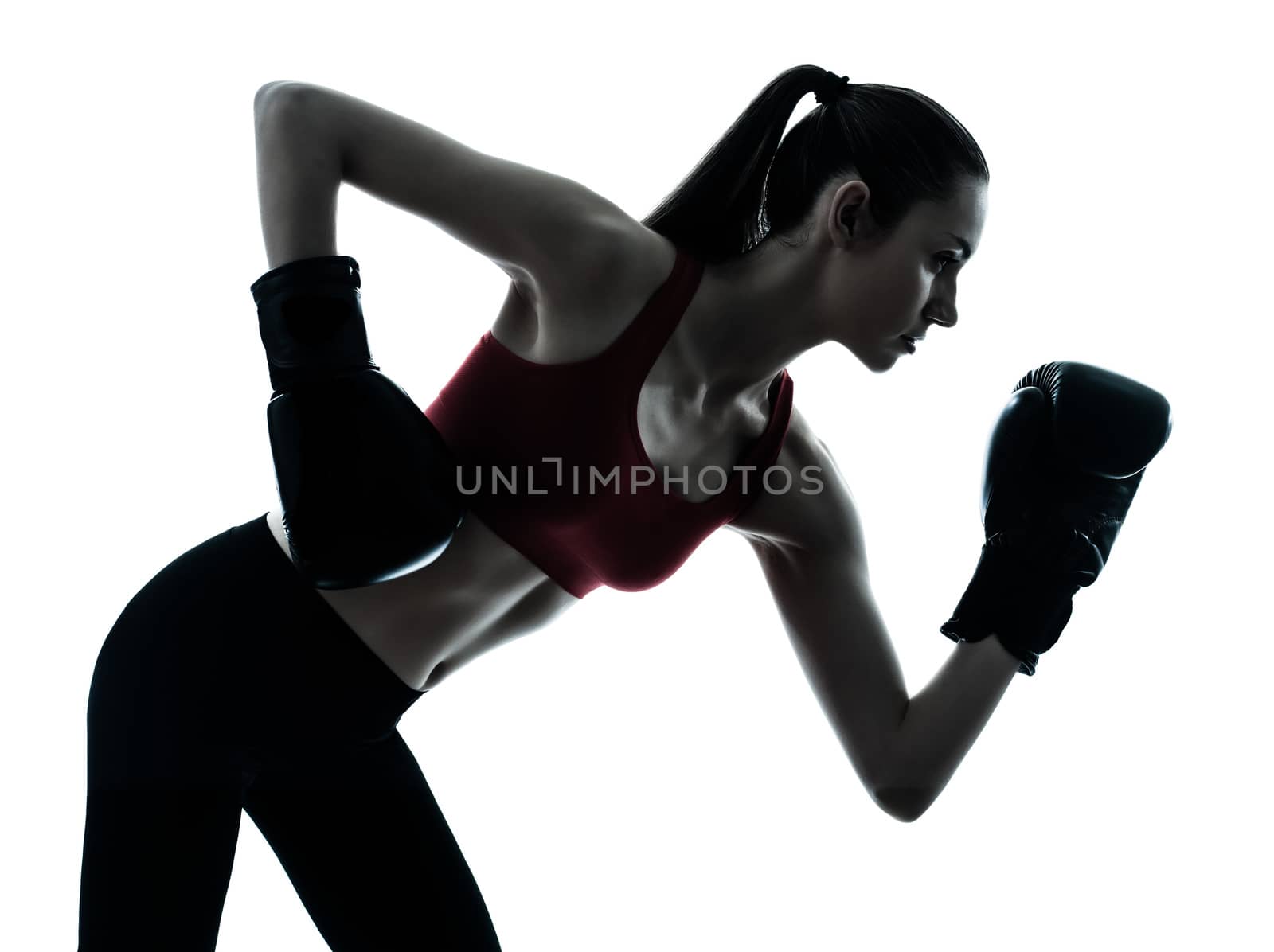 one  woman boxing exercising in silhouette studio isolated on white background