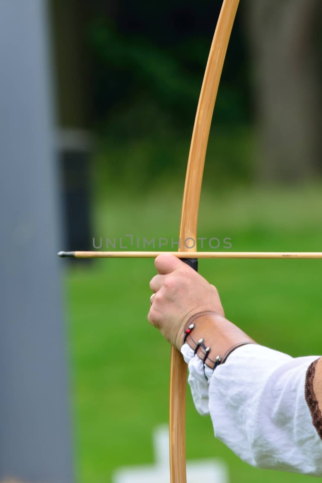 Detail of arrow being fired