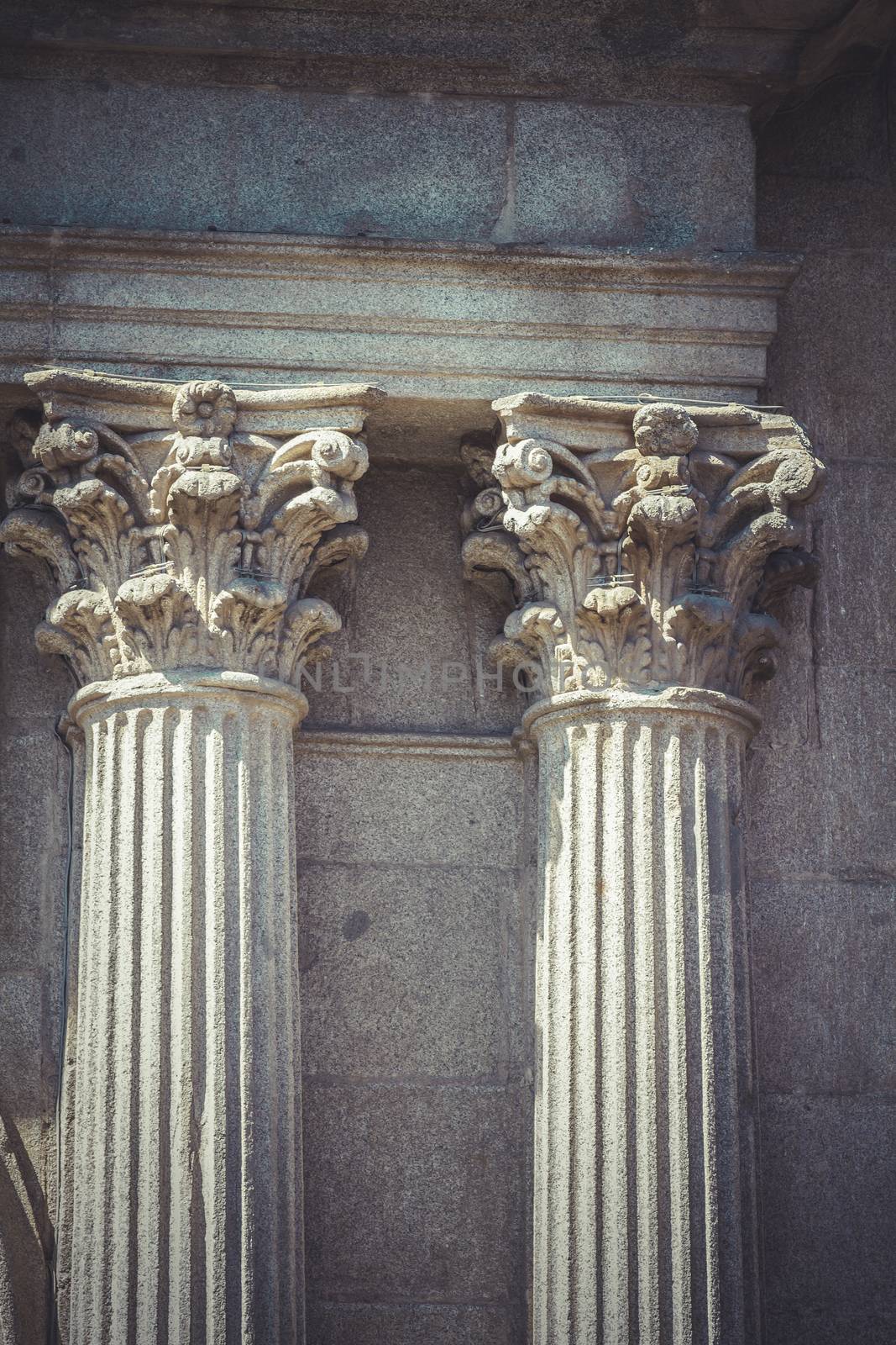 Temple, Corinthian capitals, stone columns in old building in Spain